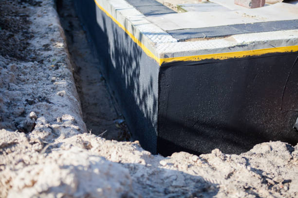 Professional Waterproofing technician working in Fishers, IN